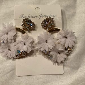 White earrings with flowers